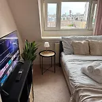 Cosy By The Casa de hóspedes *