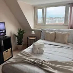 Cosy By The Casa de hóspedes