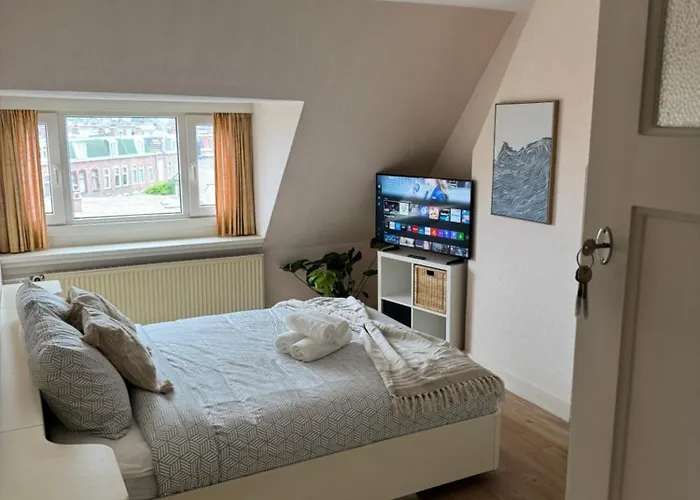 Cosy By The * האג